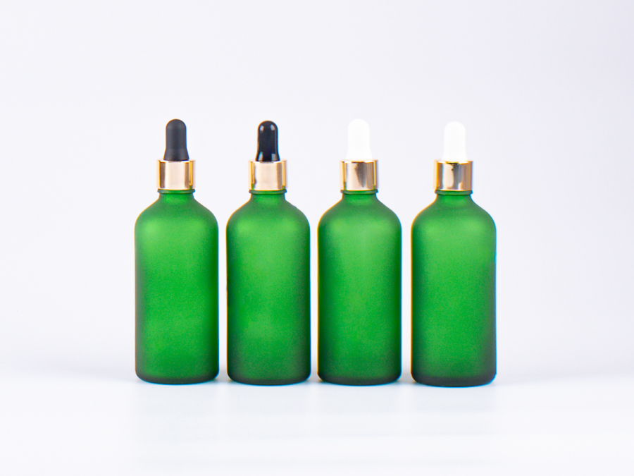 Grünglasflasche 100ml, mit Pipette gold
